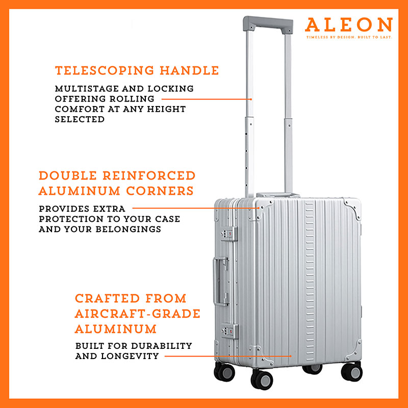 The ALEON 21" Carry-On rests beside a plush airport lounge chair, its refined metallic finish complementing the sophisticated travel setting. Designed for durability and elegance, it exudes premium craftsmanship and functionality.