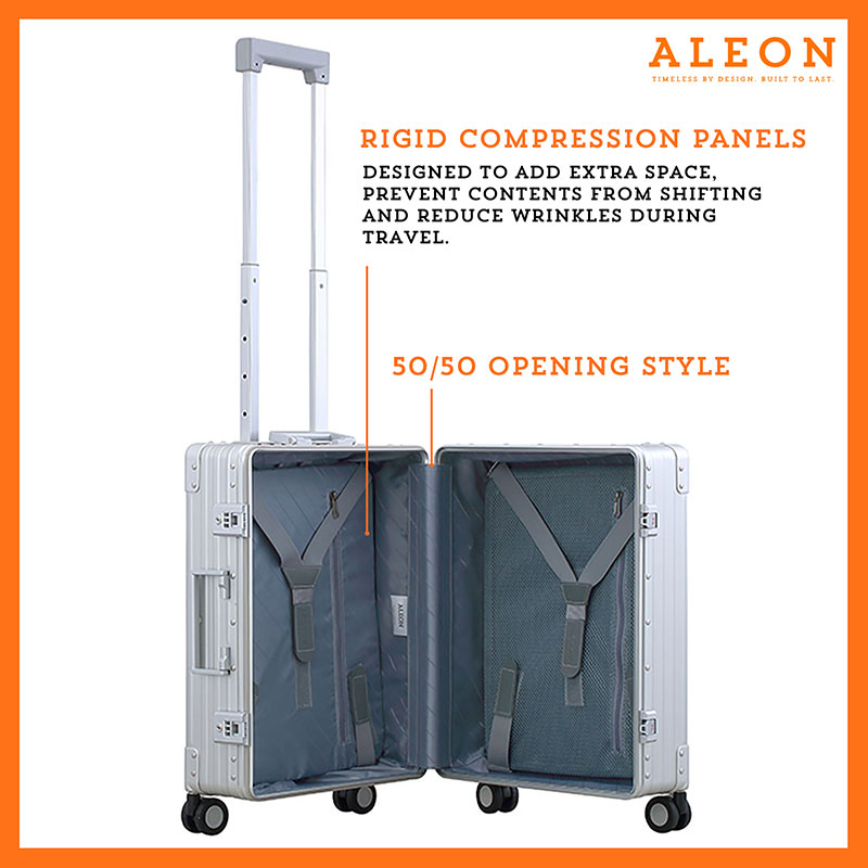 An open platinum ALEON 21" Carry-On reveals a neatly arranged interior with compression panels and secure straps, showcasing its well-structured design for organized packing. The TSA-approved locking mechanism adds an extra layer of security.