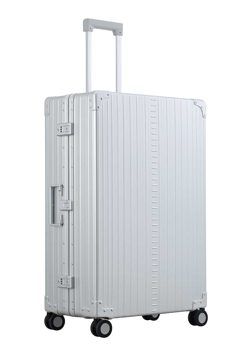 Side front profile of Aleon 32" Checked Luggage made for long trips with durable aluminum exterior