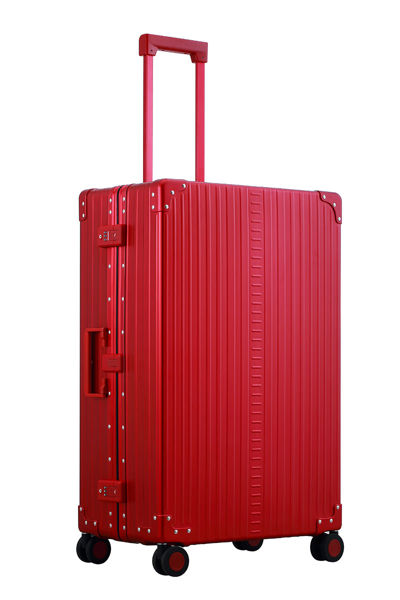 Ruby Red Aleon aluminum checked luggage angled side profile showcasing full case design
