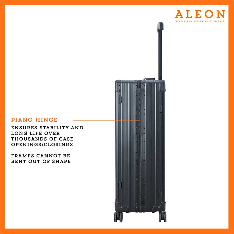 The ALEON 32″ Macro Plus Traveler Large Check-In, crafted from aircraft-grade aluminum, stands upright on a pristine hotel lobby floor. Its hard-shell design, reinforced corners, and TSA-approved locks emphasize security and durability for long-haul journeys.