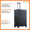 3255-ON-B078CXZXG2-side-1-(1) The black onyx ALEON 32″ Macro Plus glides smoothly through an airport terminal, its high-performance wheels designed for quiet and stable movement. The ergonomic telescoping handle ensures comfortable handling, even in bustling travel environments.