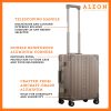 B01LZO1GXS-CH-side-(2) A polished aluminum ALEON 21" Carry-On stands upright on a glossy airport floor, reflecting ambient lighting. Its durable, hard-shell construction and smooth wheels embody modern travel efficiency.