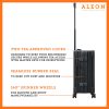 B079VMSMN7-ON-Lock-(2) The ALEON 21" black Carry-On rests beside a plush airport lounge chair, its refined metallic finish complementing the sophisticated travel setting. Designed for durability and elegance, it exudes premium craftsmanship and functionality.