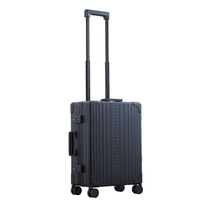Side profile view of international carry on in onyx black