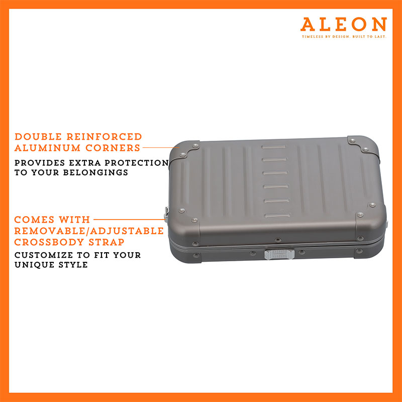 ALEON bronze crossbody case displayed with highlighted features, including double reinforced aluminum corners for enhanced durability and an aluminum clasp for secure closure. The case is open, revealing organized interior compartments. Brand name 'ALEON' and tagline 'TIMELESS BY DESIGN. BUILT TO LAST.' are shown at the top right.