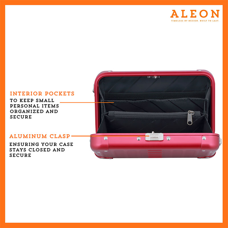 ALEON red ruby crossbody case displayed with highlighted features, including double reinforced aluminum corners for enhanced durability and an aluminum clasp for secure closure. The case is open, revealing organized interior compartments. Brand name 'ALEON' and tagline 'TIMELESS BY DESIGN. BUILT TO LAST.' are shown at the top right.