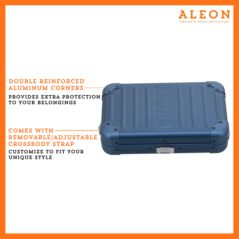 ALEON sapphire blue crossbody case displayed with highlighted features, including double reinforced aluminum corners for enhanced durability and an aluminum clasp for secure closure. The case is open, revealing organized interior compartments. Brand name 'ALEON' and tagline 'TIMELESS BY DESIGN. BUILT TO LAST.' are shown at the top right.