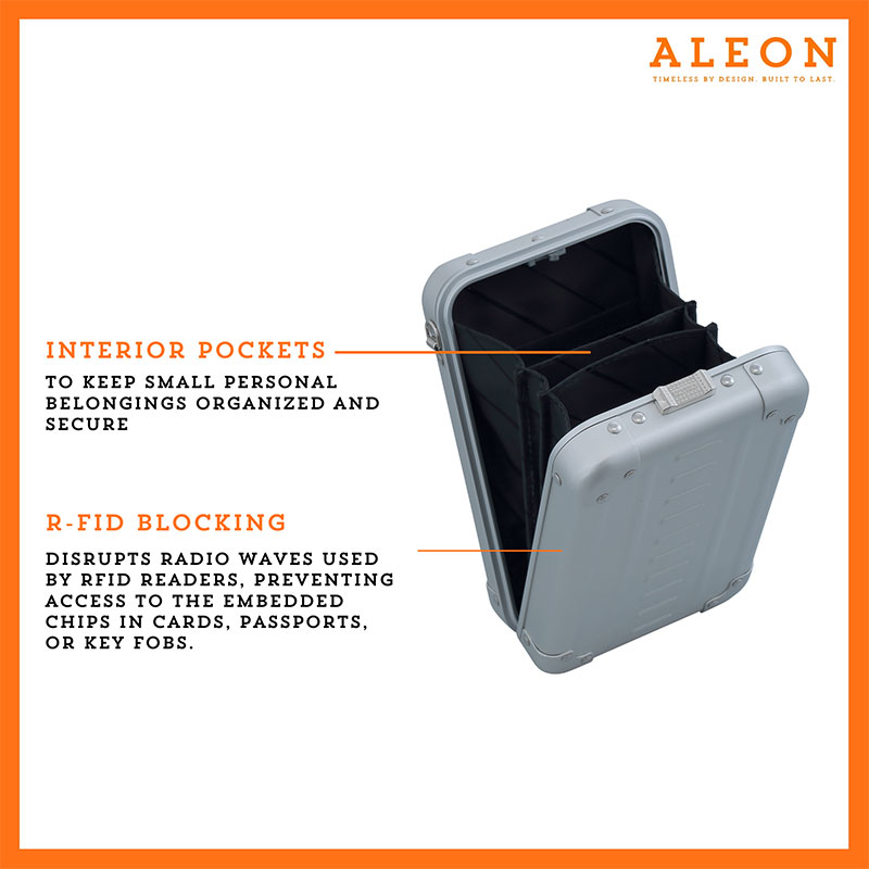 Aleon vertical platinum silver crossbody bag featuring interior RFID-blocking pockets for secure storage. The bag is open, showcasing multiple organized compartments designed to protect personal items such as cards and passports. Aleon logo and tagline 'Timeless by design. Built to last.' are displayed in the top right corner.
