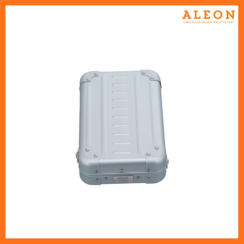 Platinum silver Aleon Vertical opening crossbody case lying flat with opening facing forward