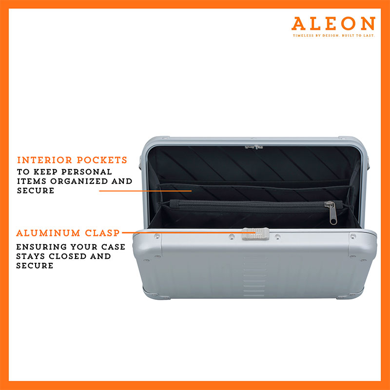 ALEON large silver crossbody case displayed with highlighted features, including double reinforced aluminum corners for enhanced durability and an aluminum clasp for secure closure. The case is open, revealing organized interior compartments. Brand name 'ALEON' and tagline 'TIMELESS BY DESIGN. BUILT TO LAST.' are shown at the top right.