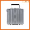 2612-PL-front The image features a platinum silver ALEON Messenger Case with a sleek, modern design. Vertical ridges run across the aluminum exterior, reinforced with metal rivets at the corners for durability. A black handle sits at the top, complementing the case’s bold aesthetic.
